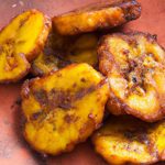 Tostones Unwrapped: Crispy Plantain Bites with a Twist